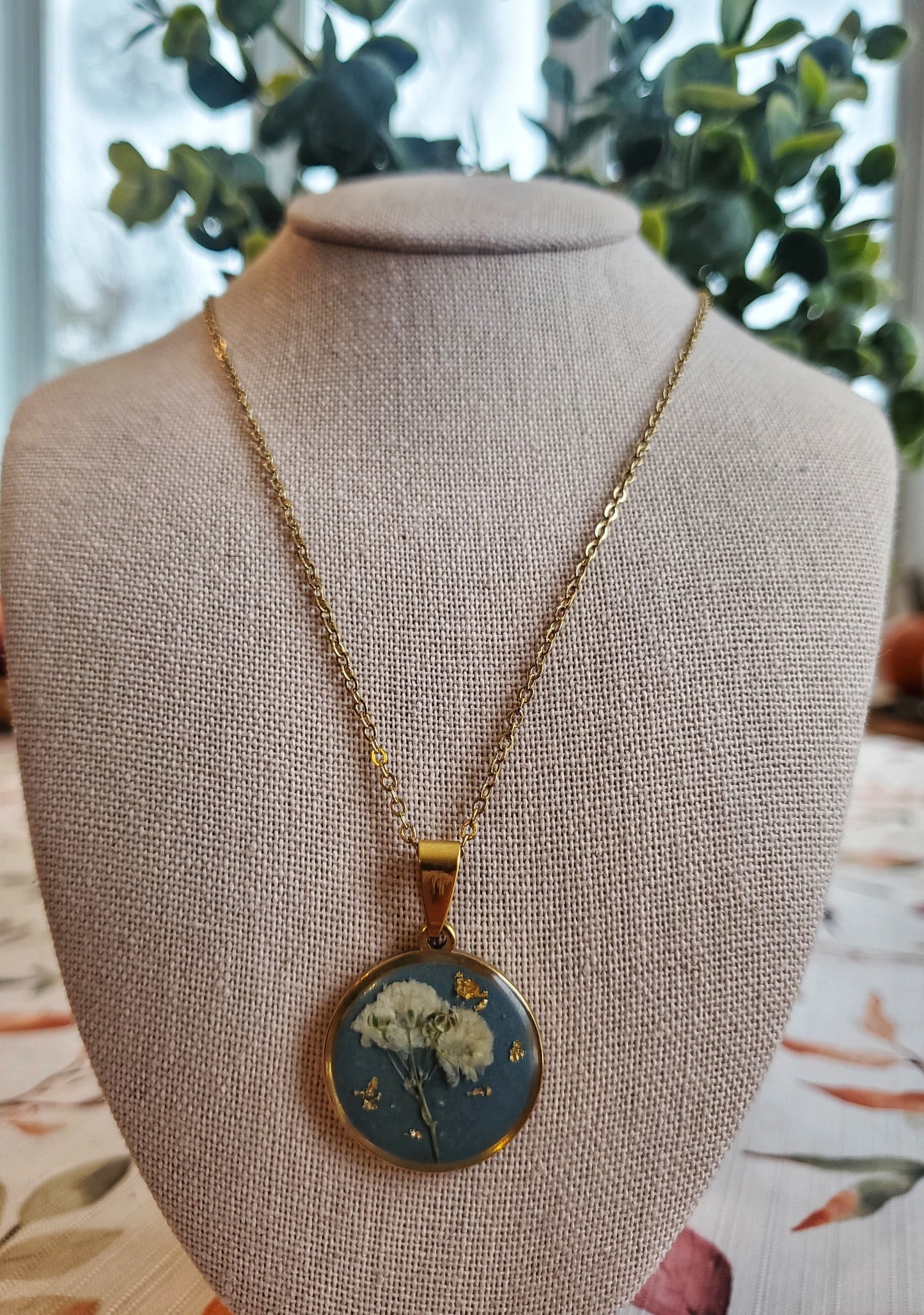 Pendentif botanique bleu
