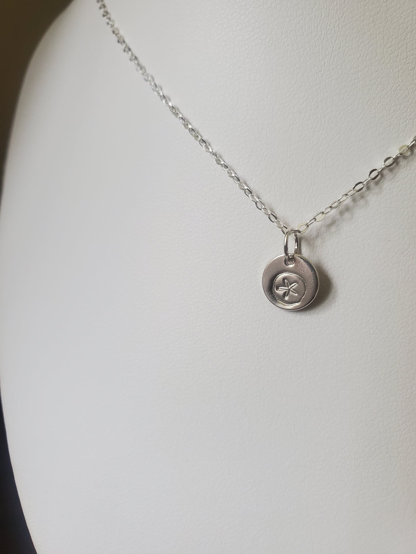 Dollar de sable argent