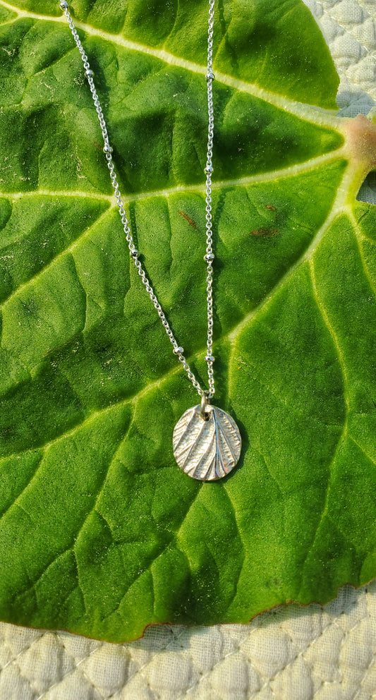 Petit médaillon feuille